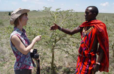 A tourist gets facts right from a local community guide